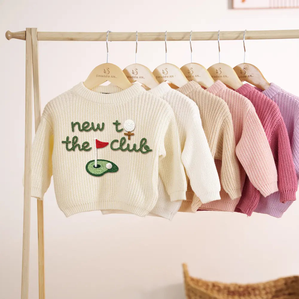 Hand-embroidered golf sweater, cream knit with embroidered "new to the club" and golf icon