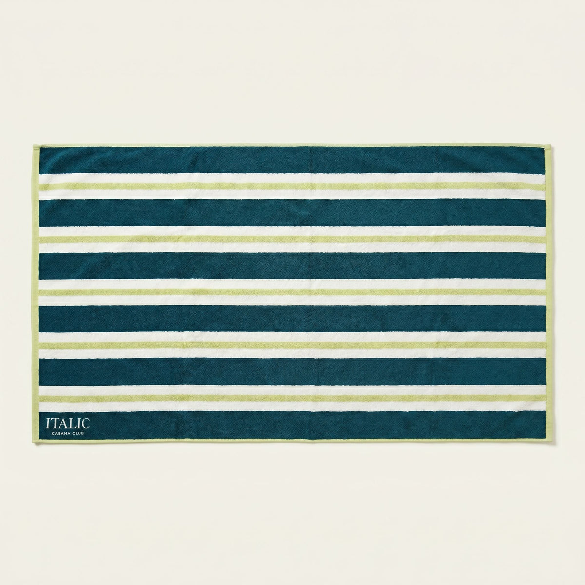Teal and white striped cotton beach towel rectangle with border and ITALIC label