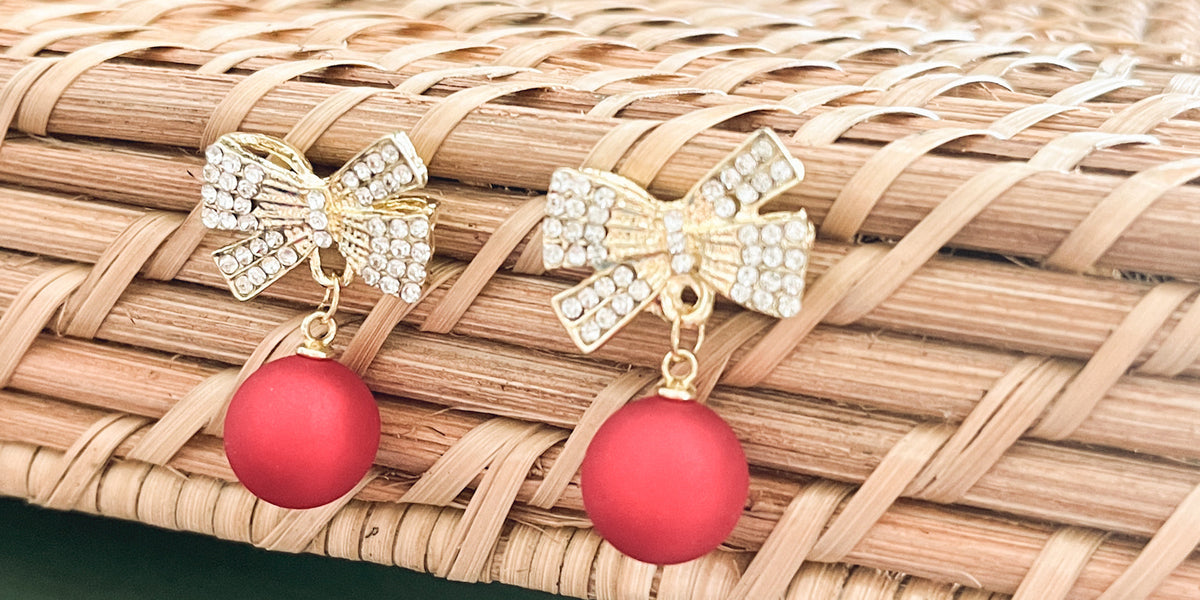 Gold bow Christmas bulb ornaments with red round bead drops, rhinestone sparkle