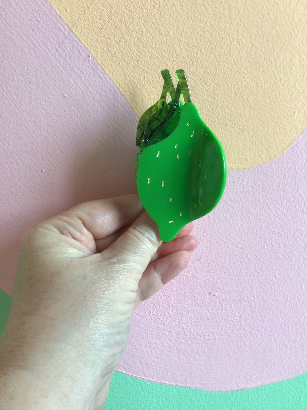 Green pickle food hair claw with ridged dark top