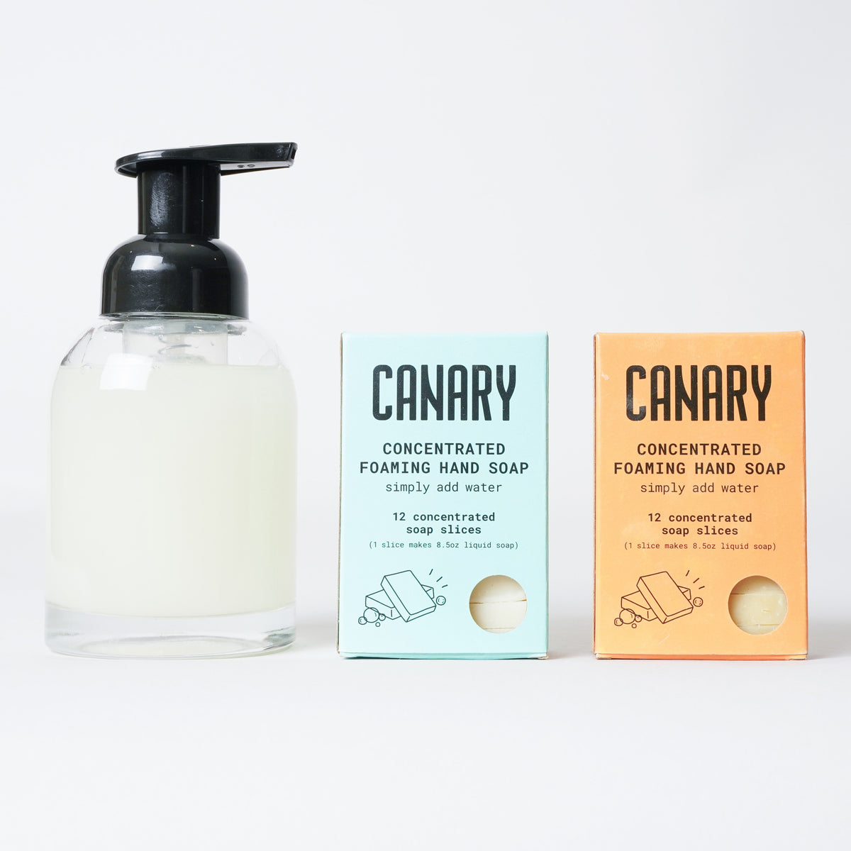 CANARY clear glass foaming soap bottle with black pump and two soap refills