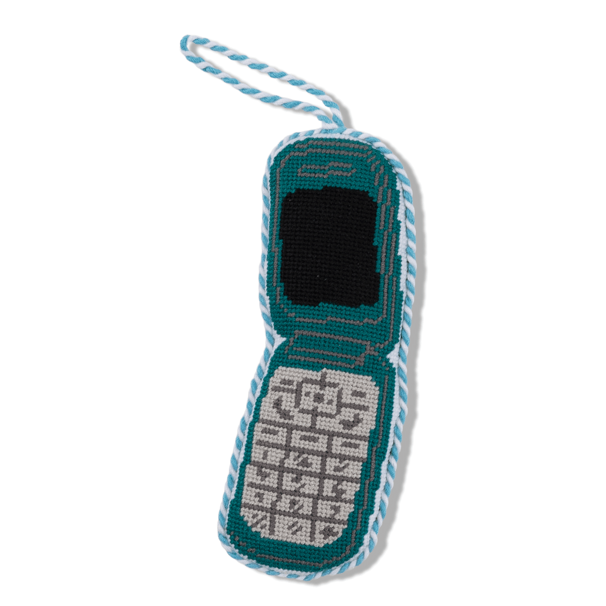 Needlepoint flip phone ornament with teal frame and black screen, striped hanging cord