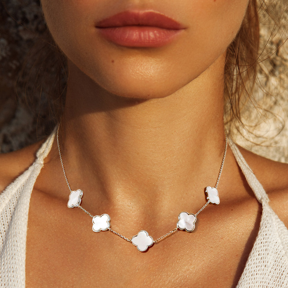 Rhodium quatrefoil pendant link necklace with five clover charms