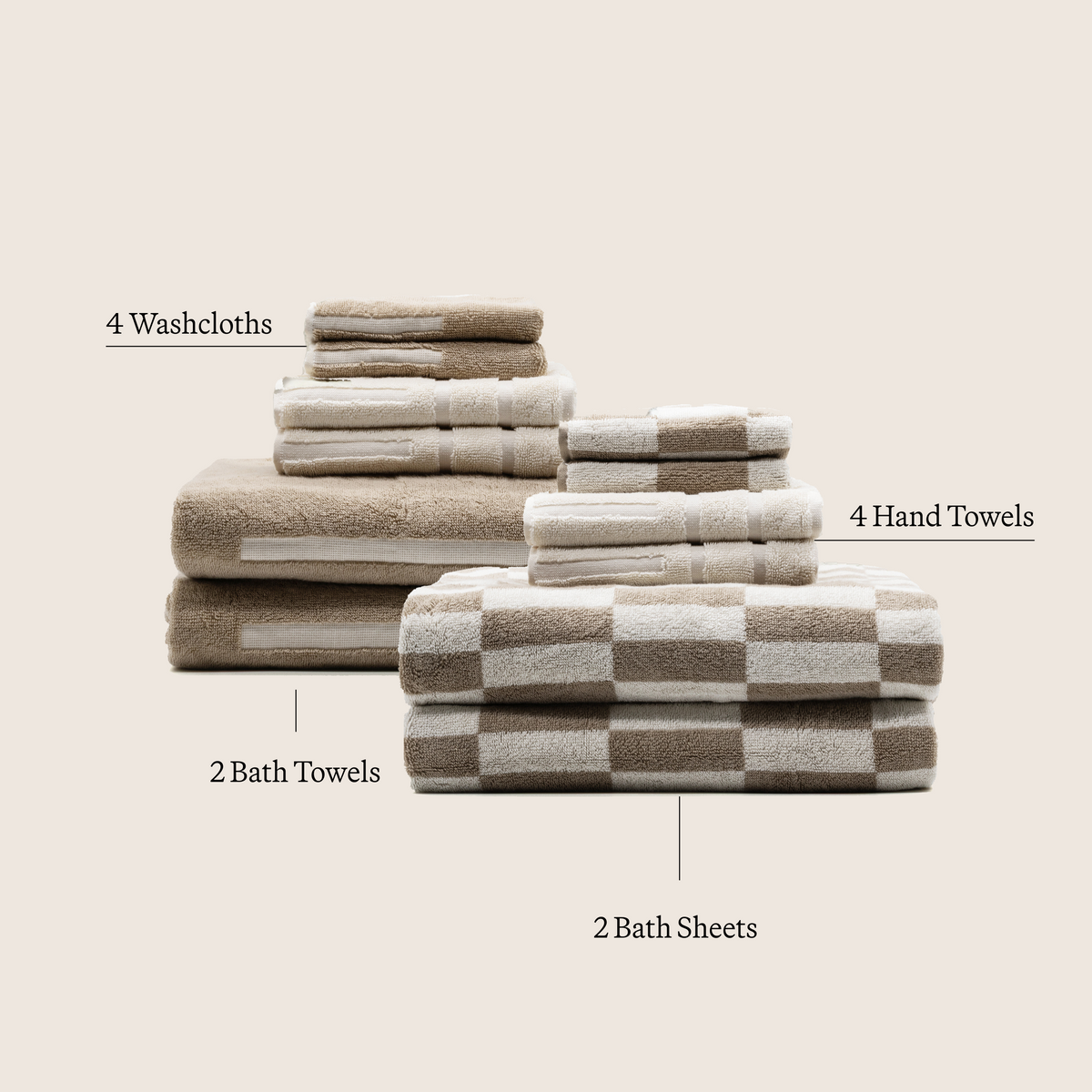 Assorted stacked cotton towels: beige solids and beige/cream check plaid