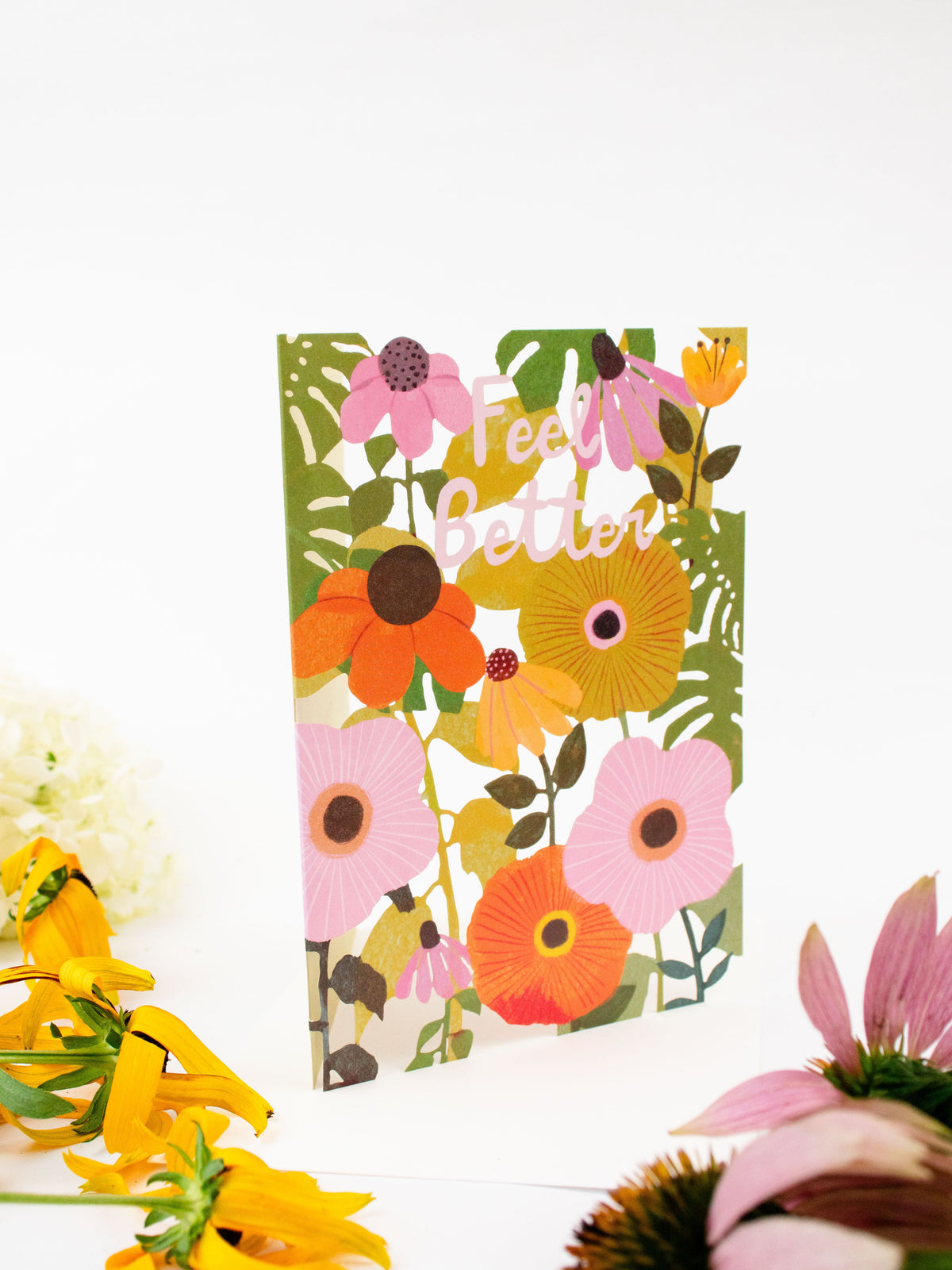 Floral laser-cut greeting card with layered flowers and “Feel Better” yellow script
