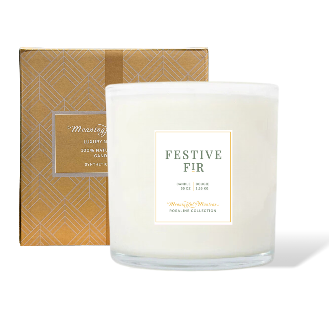 Festive Fir natural candle in a clear glass jar with gold-patterned box