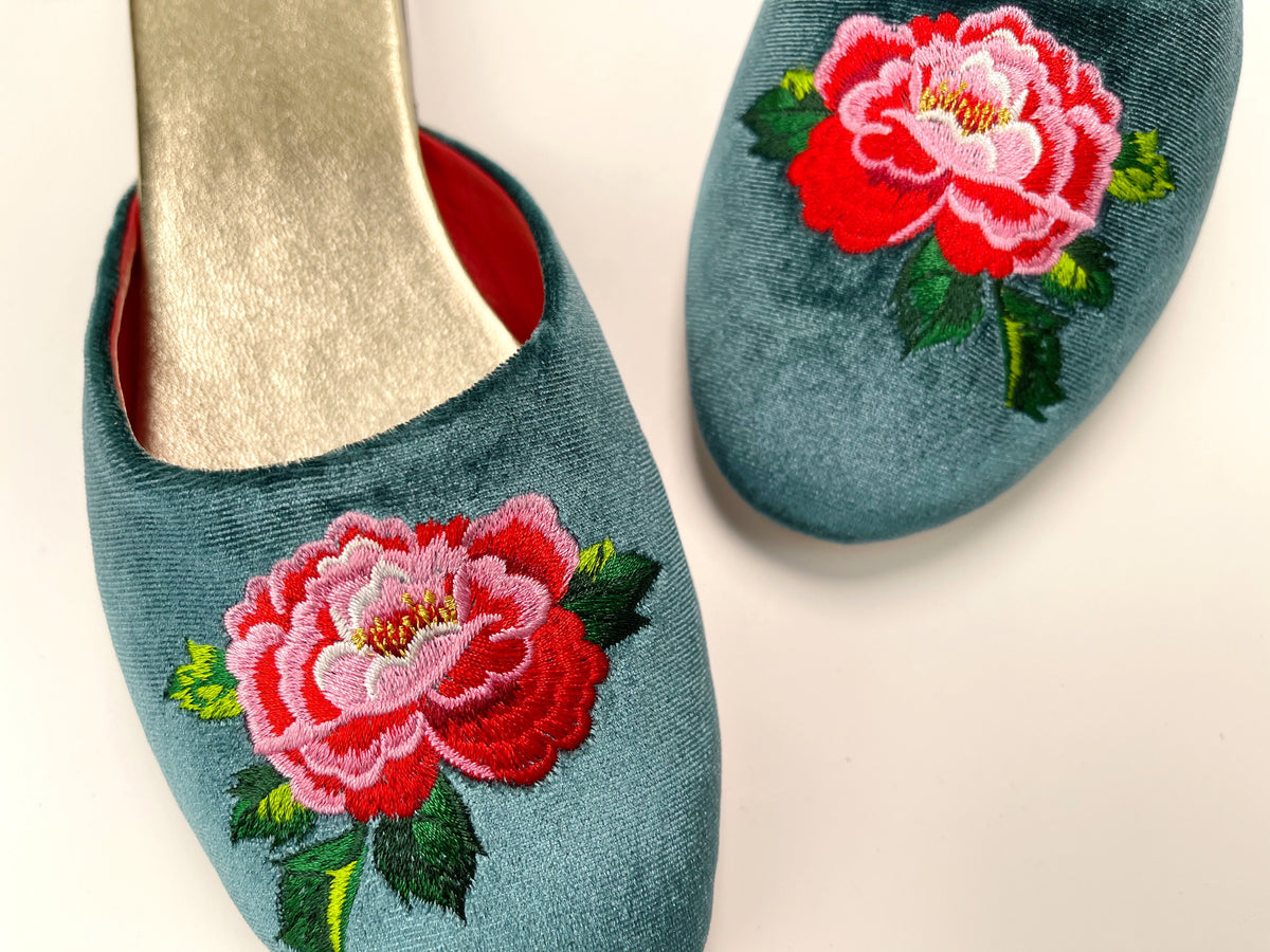 Teal velvet mule slippers with close-up red peony and green leaf embroidery