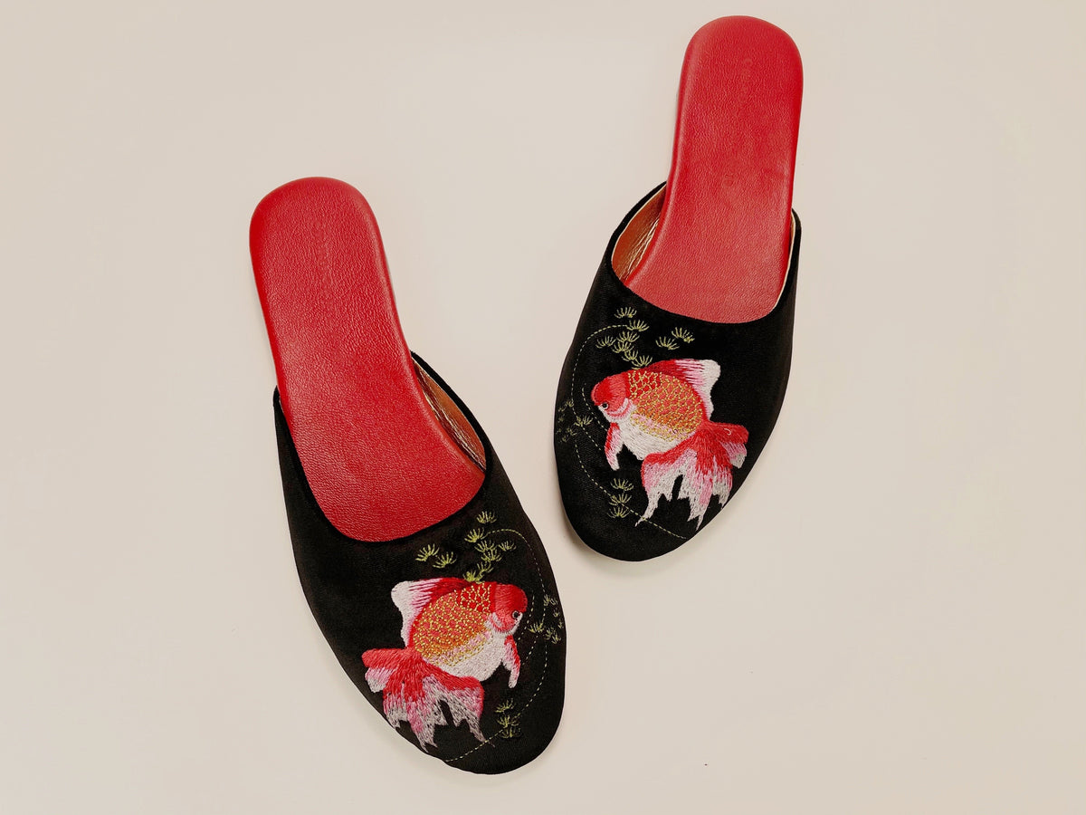 Pair of black velvet mule slippers with goldfish embroidery on toes