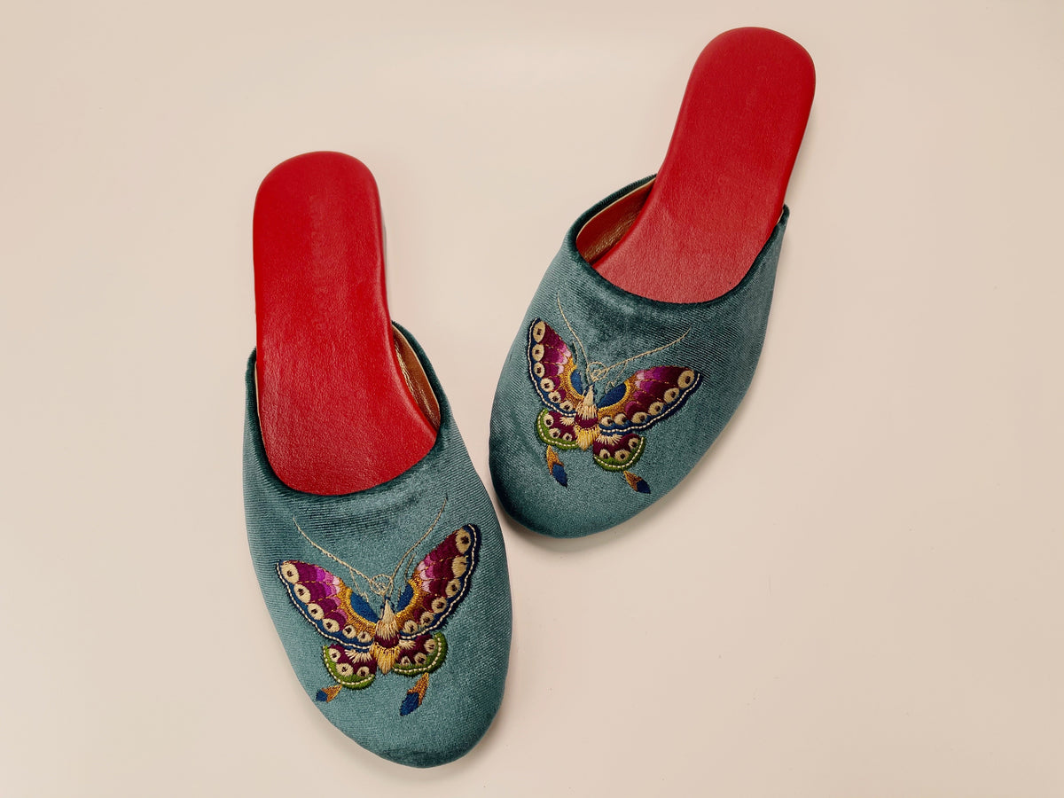 Teal velvet mule slippers with embroidered butterfly, red interior lining