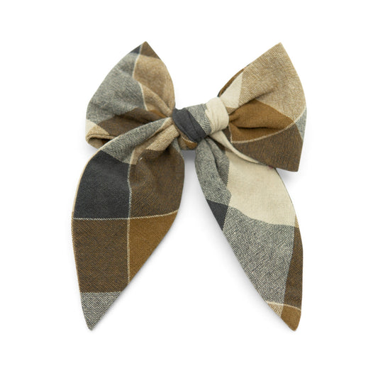 Plaid hair bow in tan, olive, and dark gray with knotted center