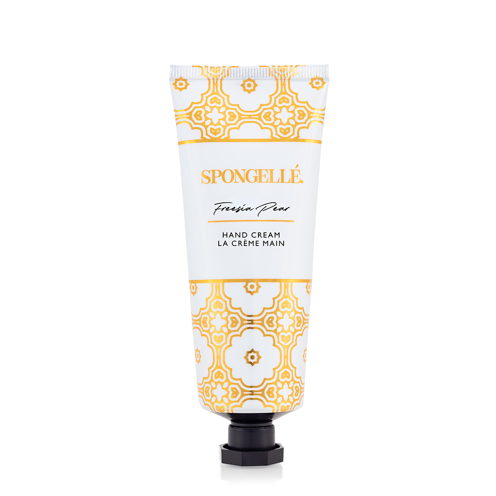 Hand cream tube front view, white with orange geometric design and black cap