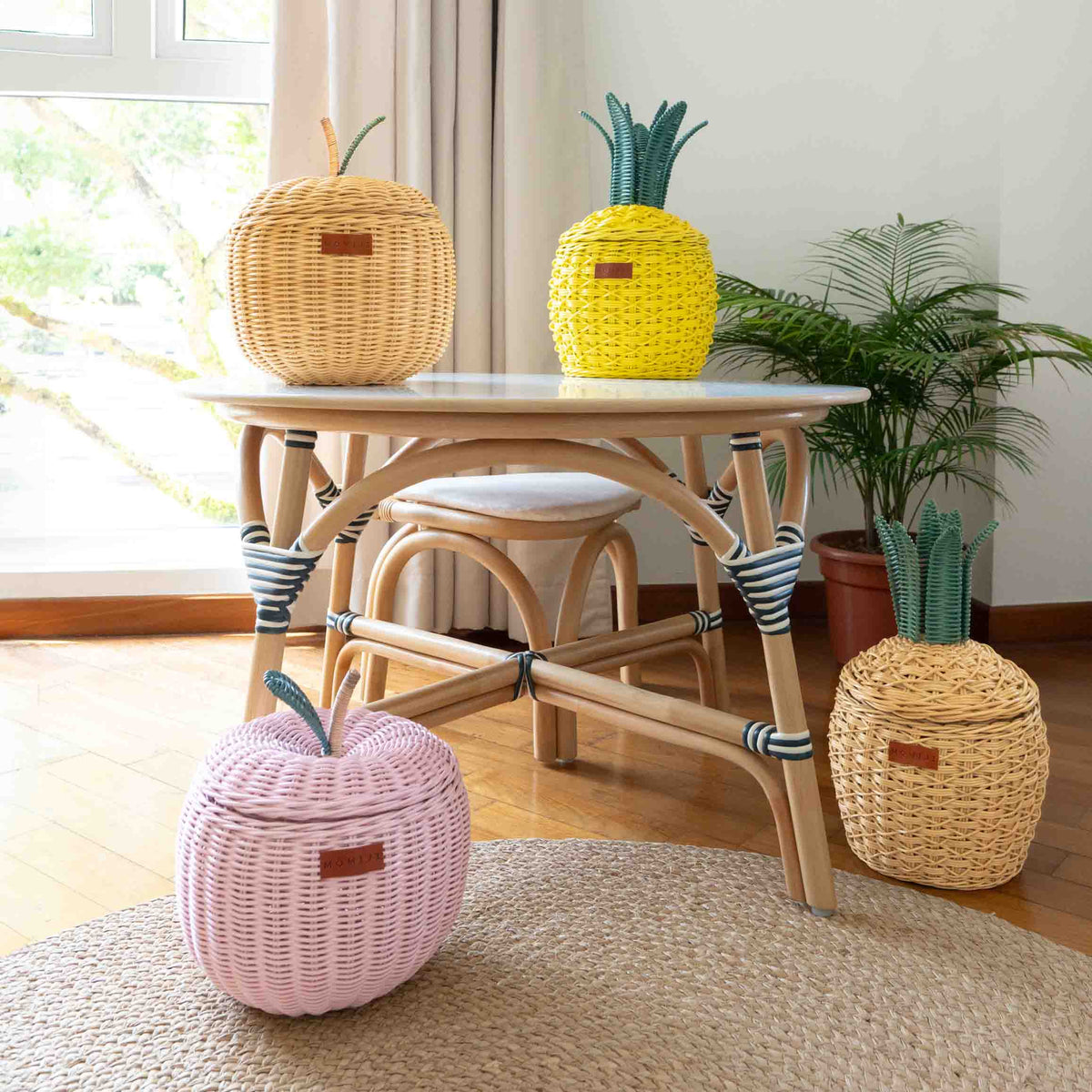 Natural rattan pineapple basket with green woven leaves and lid