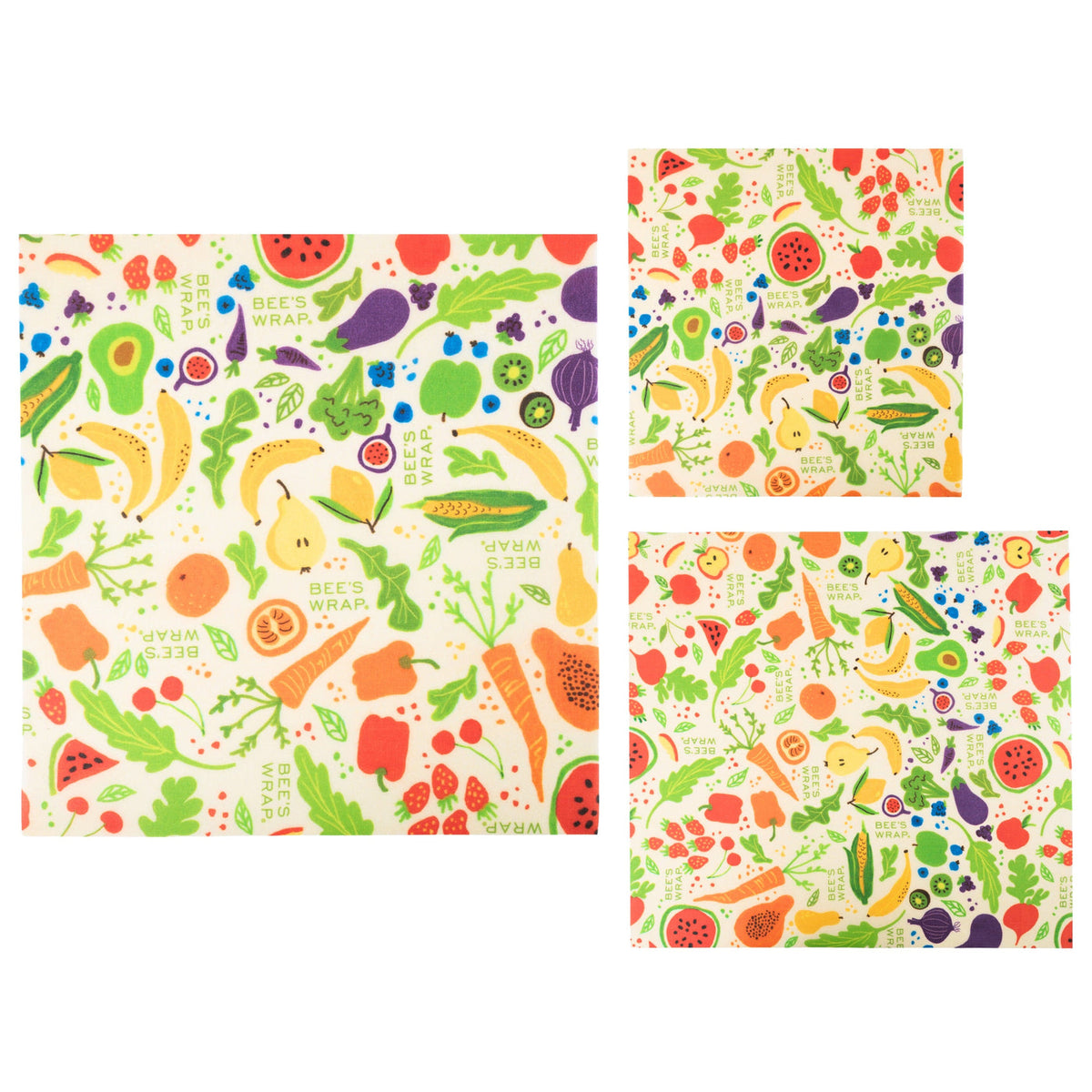 Reusable fruit-and-vegetable patterned food wraps, shown as stacked squares and sheet