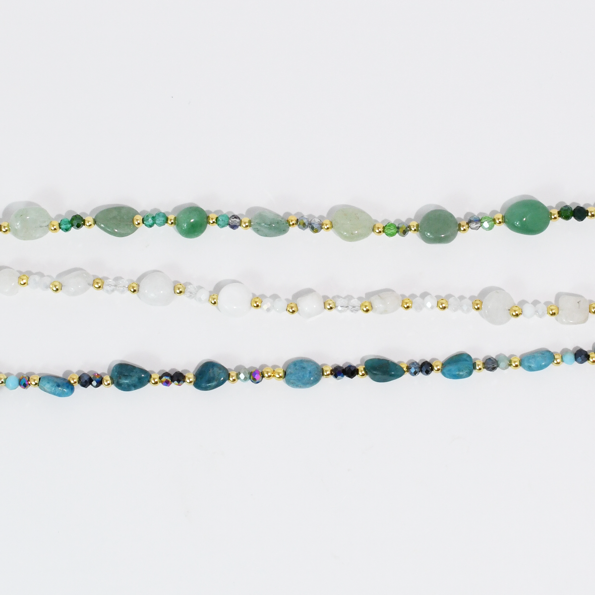 Beaded necklace set with green, white, and blue gemstone-style beads and gold-tone accents.
