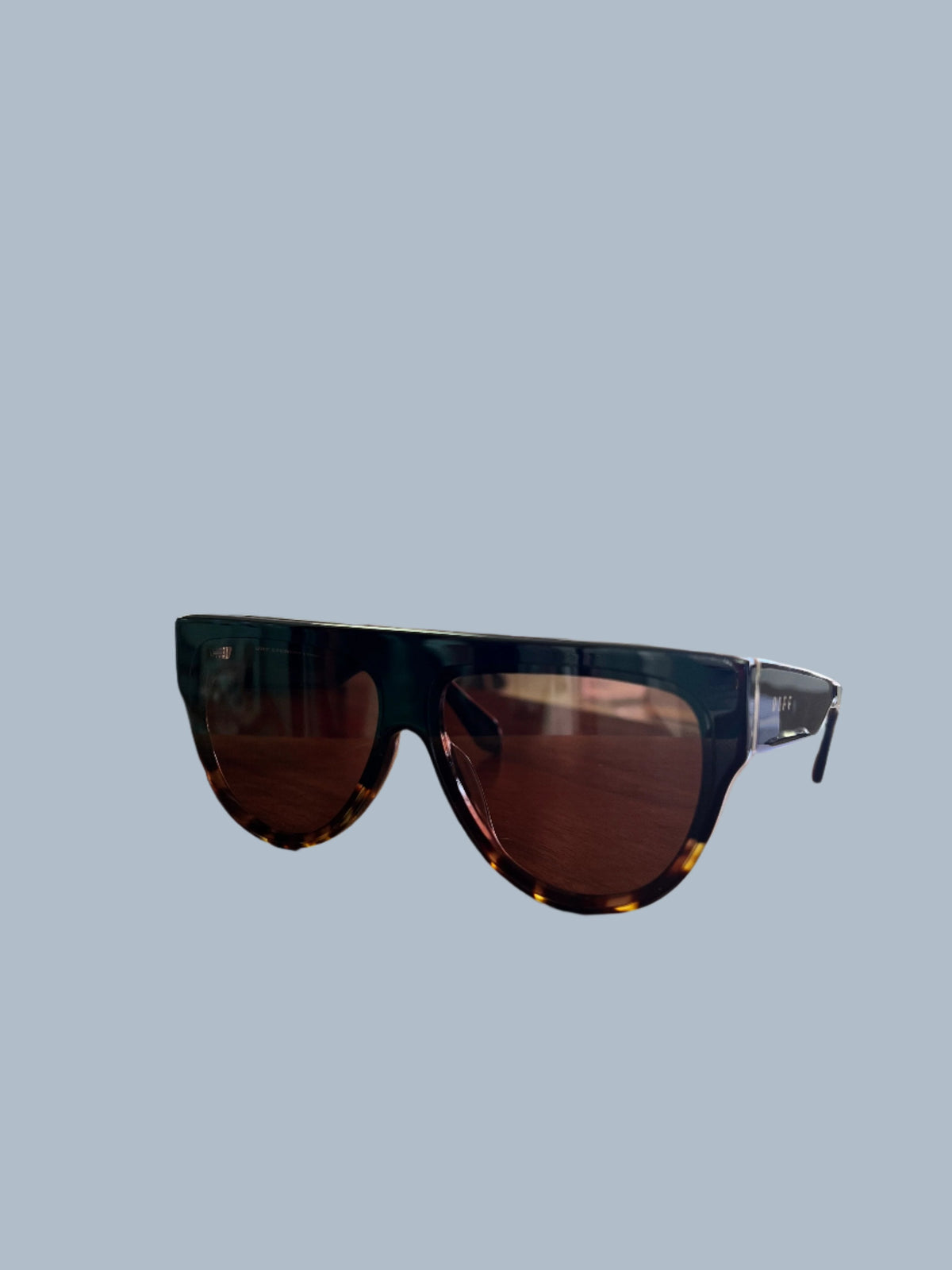 DIFF Georgie sunglasses with tortoiseshell trim and brown lenses, angled view