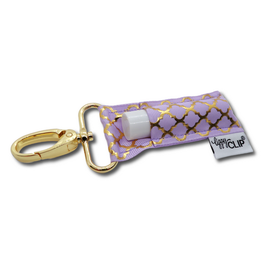Lavender quatrefoil LippyClip lip balm holder with gold clip and small white balm