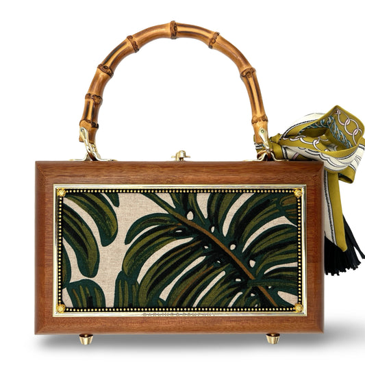 Wooden bamboo-handle handbag with green tropical print panel and gold trim