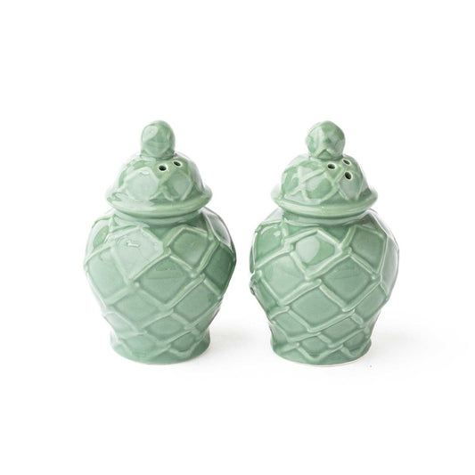 Green ceramic salt and pepper shakers with raised diamond texture and knobbed lids