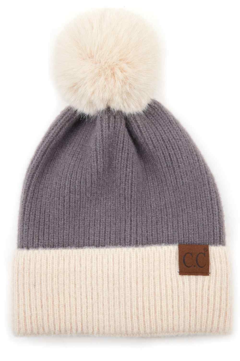 Grey knit beanie with cream cuff, beige pompom top, C.C leather patch