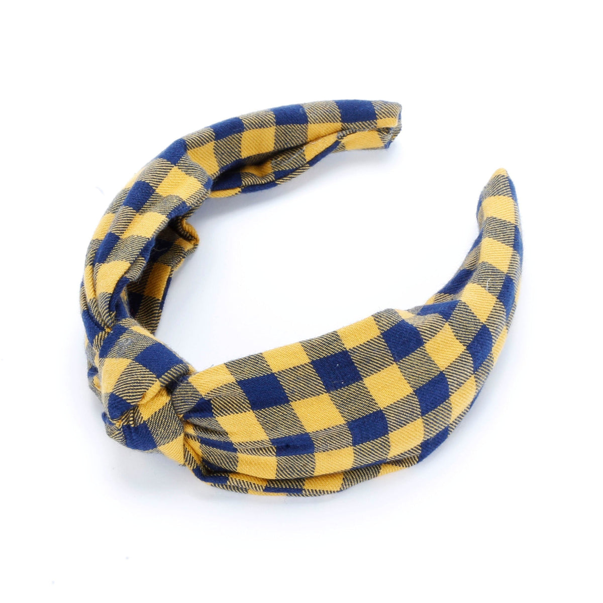 Girls' padded headband in mustard and navy plaid with a twisted front