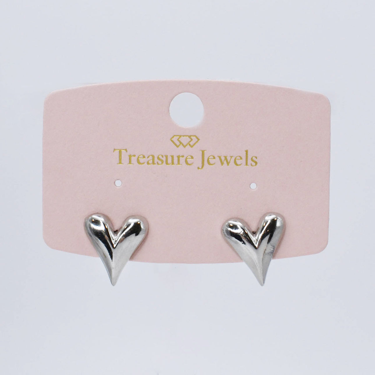 Silver heart tear stud earrings shown on a jewelry card backing