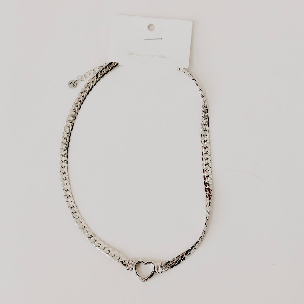 Silver-tone heart pendant necklace with curb chain and heart center charm