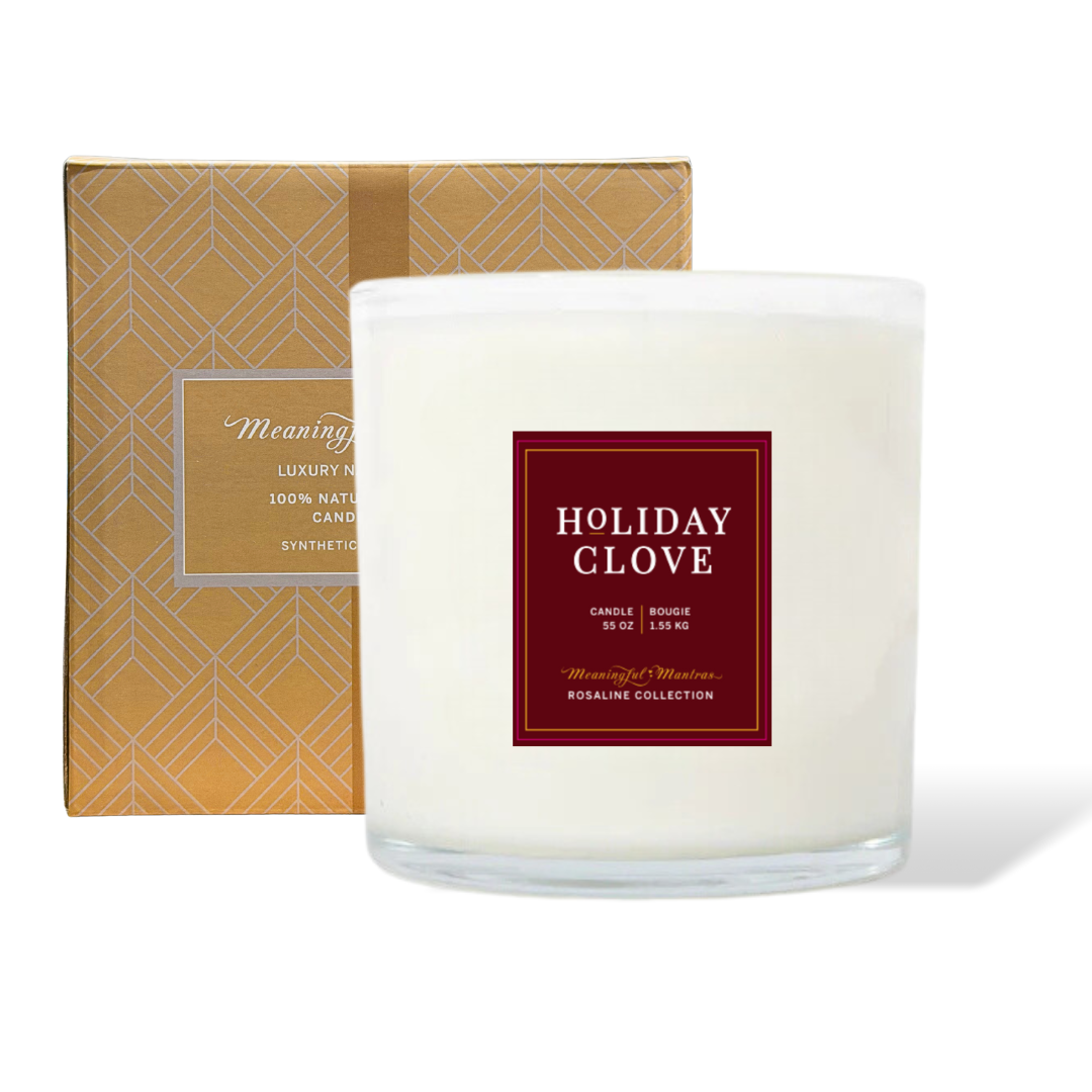 Holiday Clove candle in a clear glass jar with a red label and patterned box