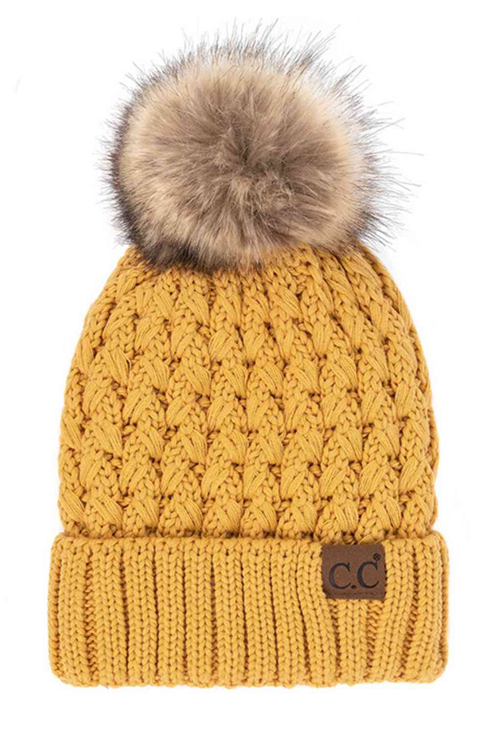 Knit beanie with pom-pom, mustard yellow cable knit, ribbed cuff and C.C. label patch