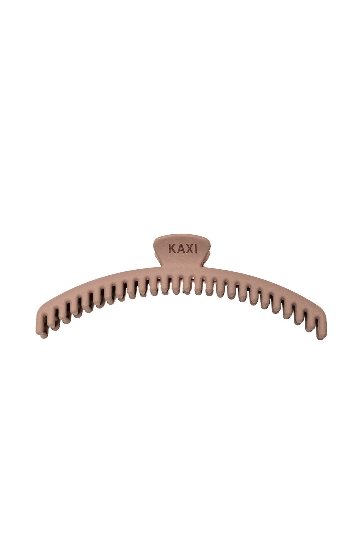 Champagne hair claw clip with comb teeth and KAXI logo on top