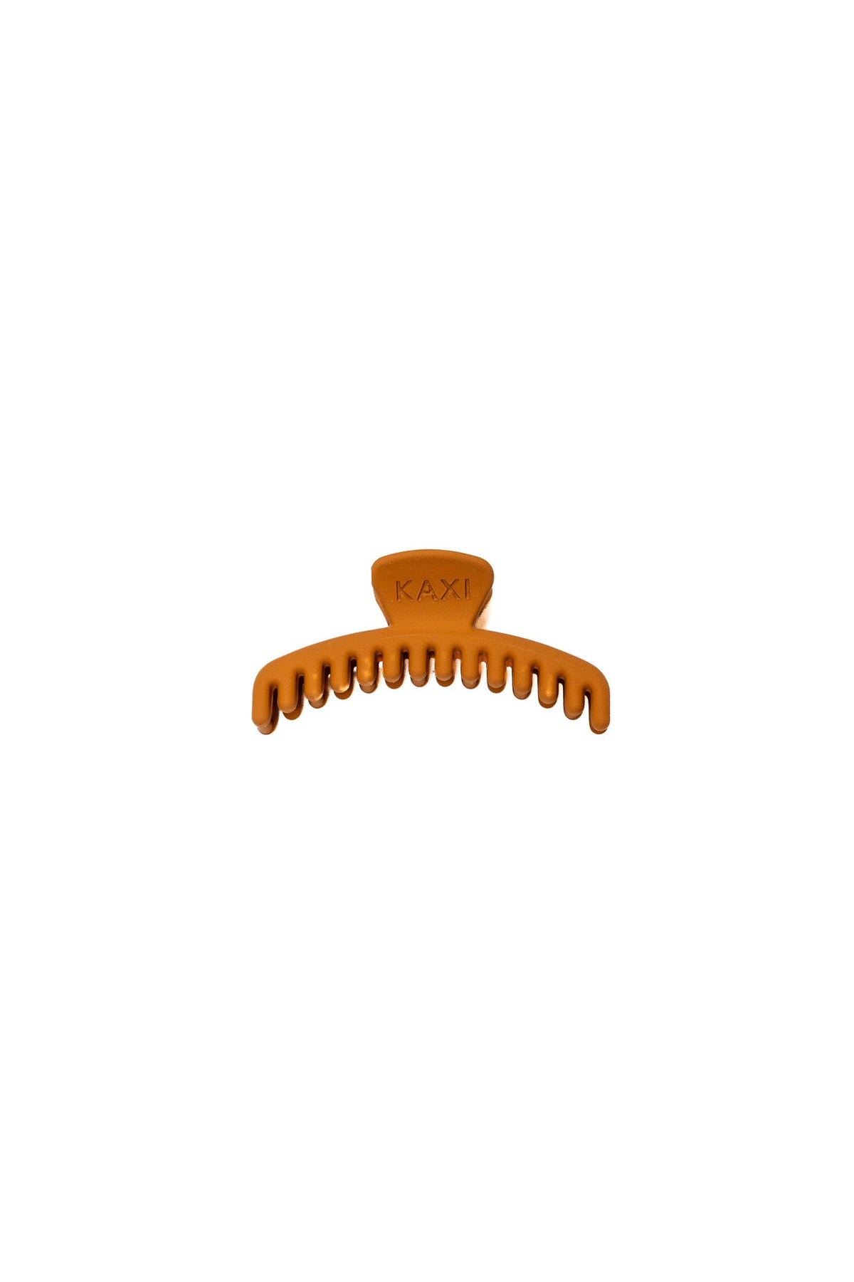 Matte mini hold-everything claw hair clip in matte orange with finger-size curve