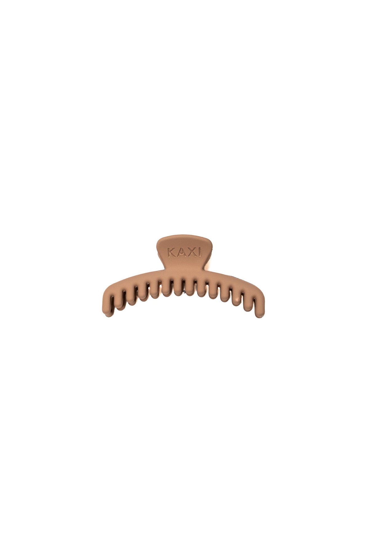 Mini matte hair claw clip close-up, tan with engraved logo
