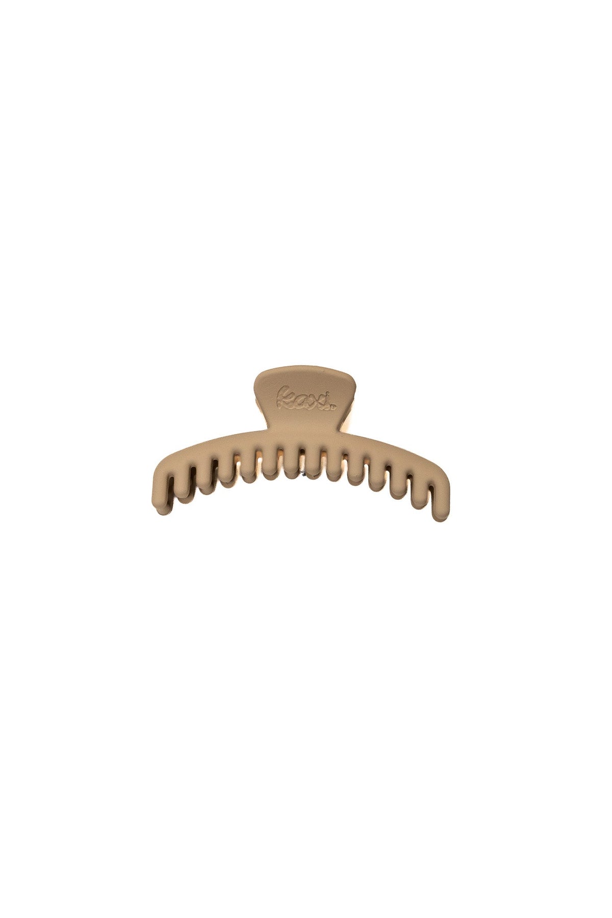 Mini matte hair claw clip close-up, light tan with engraved text