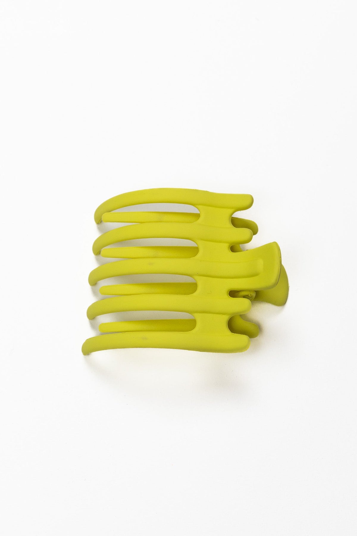 Wide hair claw clip in lime yellow, flat comb-style design