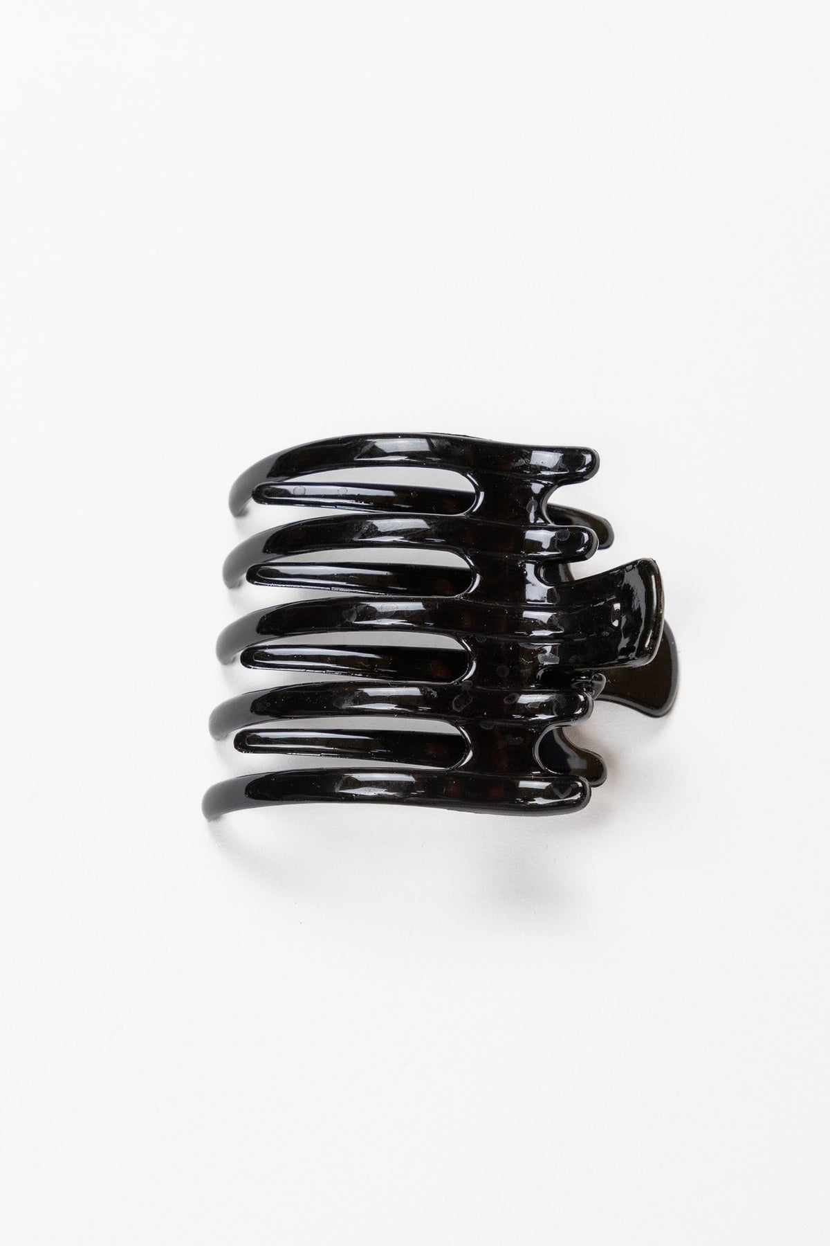 Wide laydown claw hair clip, shiny black translucent finish