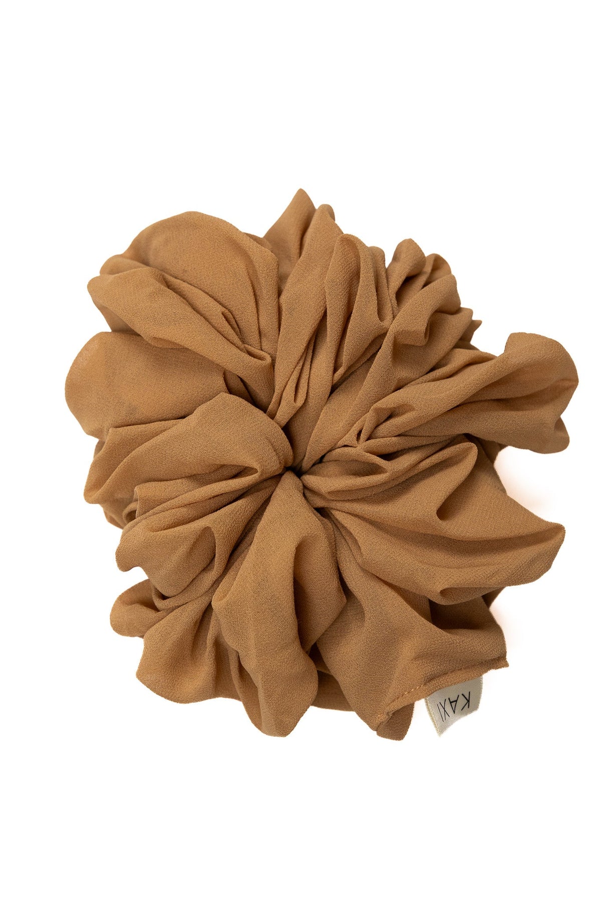 Brown jumbo scrunchie, oversized scrunched fabric flower on white