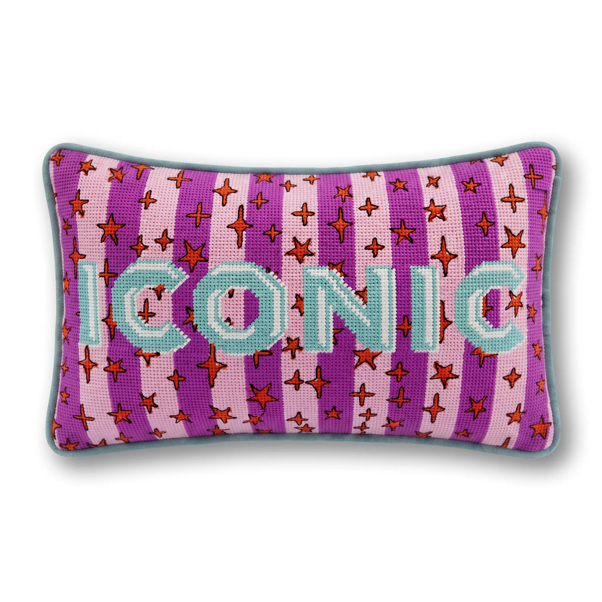 Needlepoint accent pillow with purple star-and-cross pattern and teal letter details