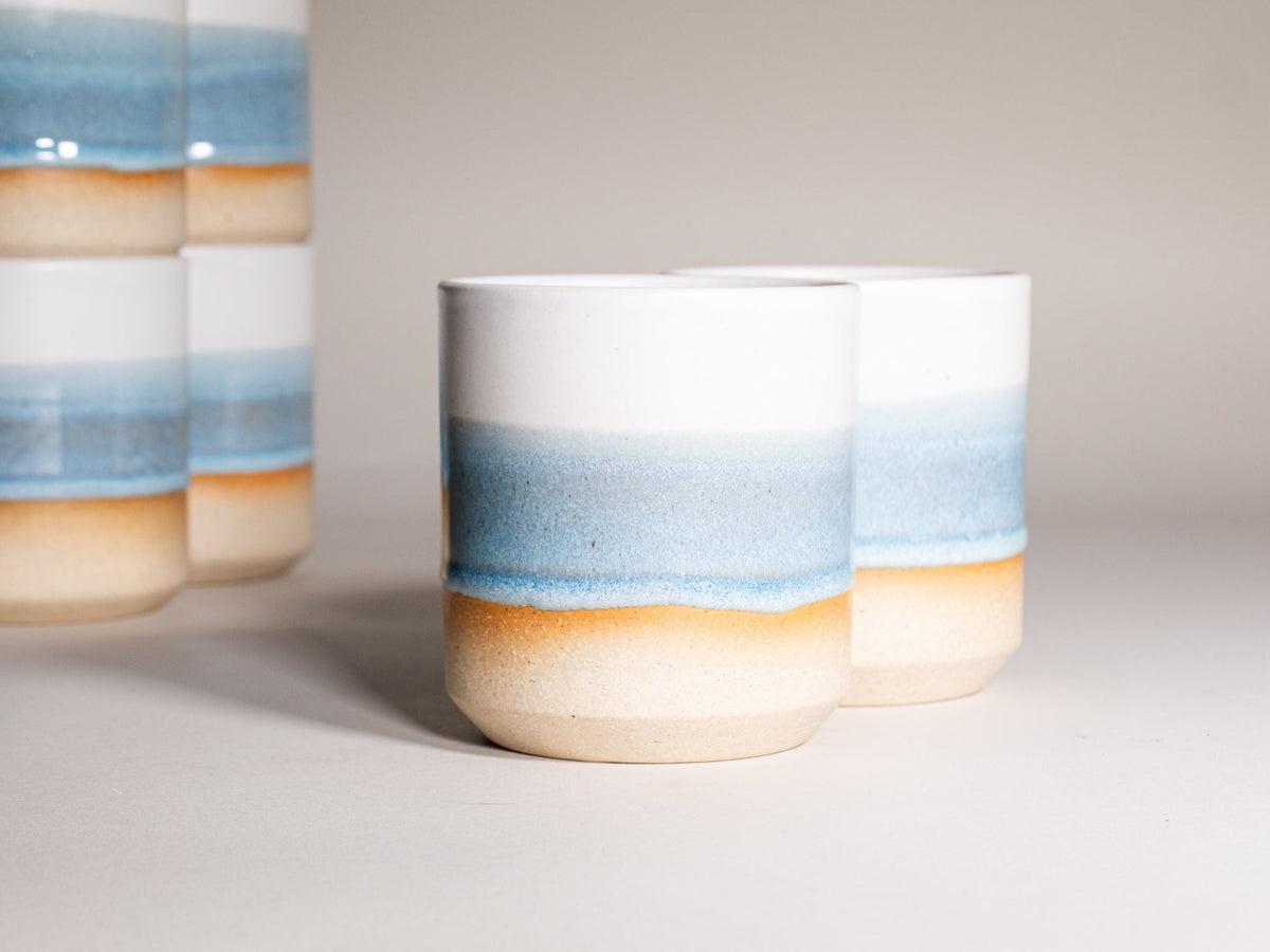 Ice blue and white stoneware smoothie cup, ombre band and cream base