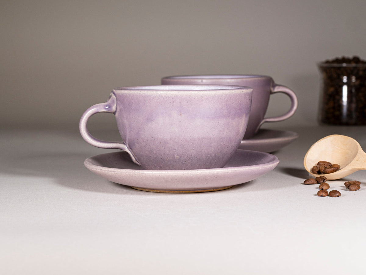 Purple stoneware cup with handle and saucer, cream base glaze, latte size 10–12 oz