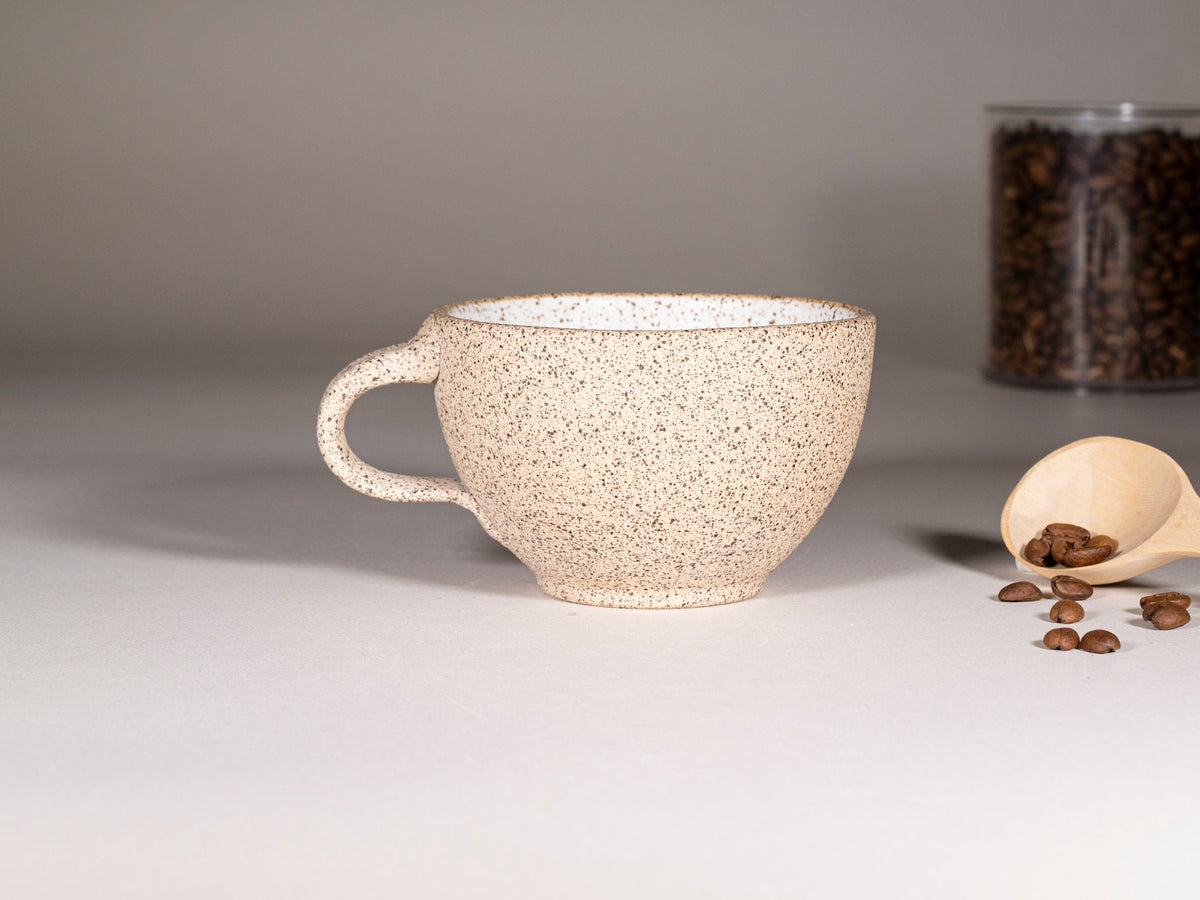 Speckled stoneware cappuccino cup with handle, no lid
