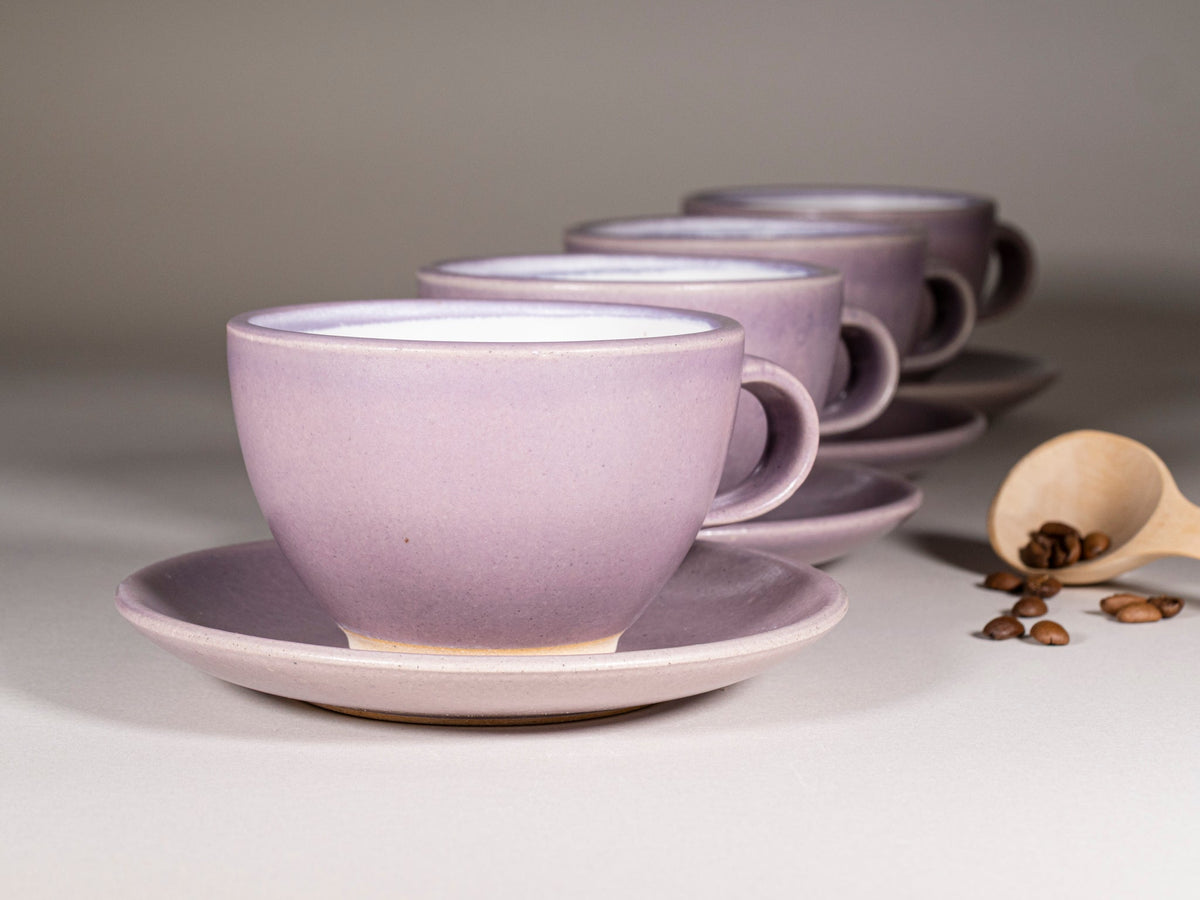 Purple stoneware cappuccino cup with handle and matching saucer, 10–12 oz.