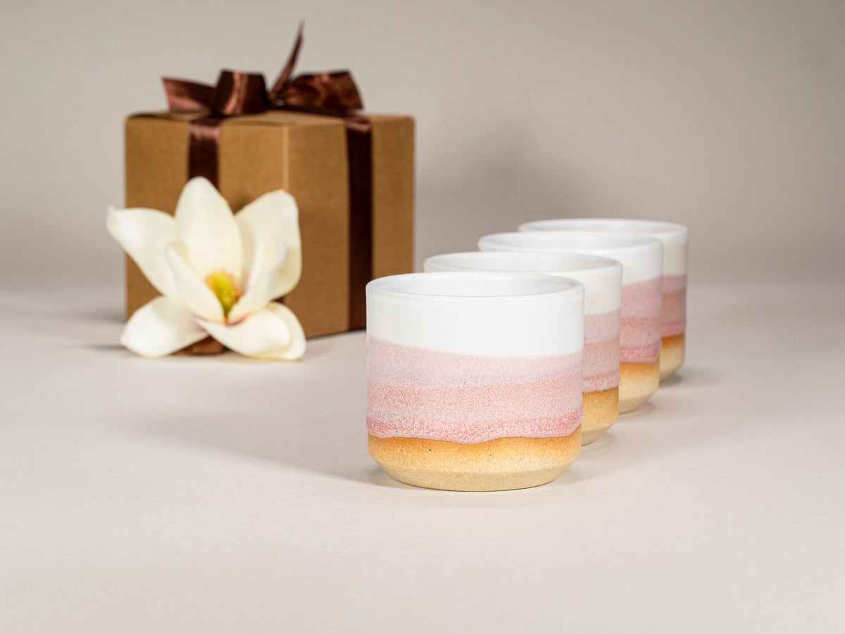 Pink and white stoneware mug set with three cups, ombre pink band finish