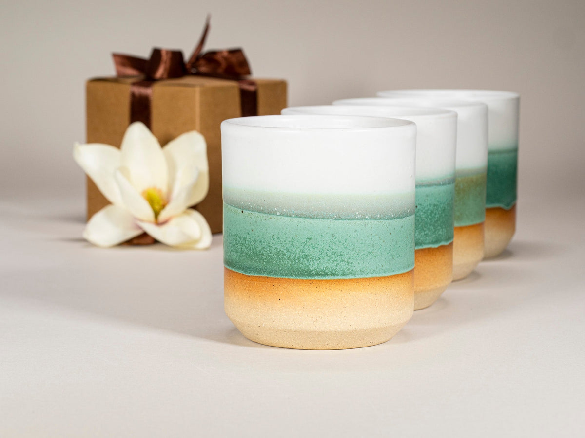 Green-and-white stoneware espresso cups gift set, four cups showing layered green bands