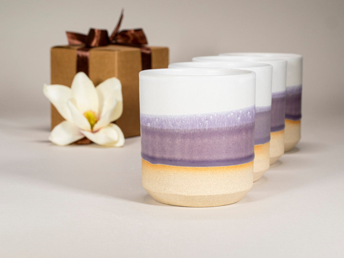 Purple and white stoneware mugs gift set, front cups with lavender and tan gradient band