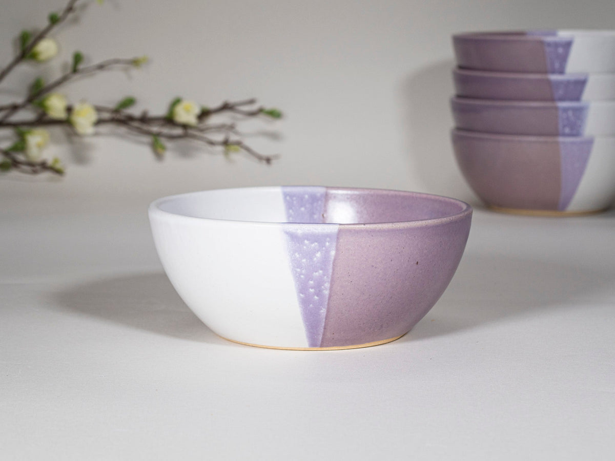 Purple and white stoneware soup bowl, two-tone interior with speckled accent