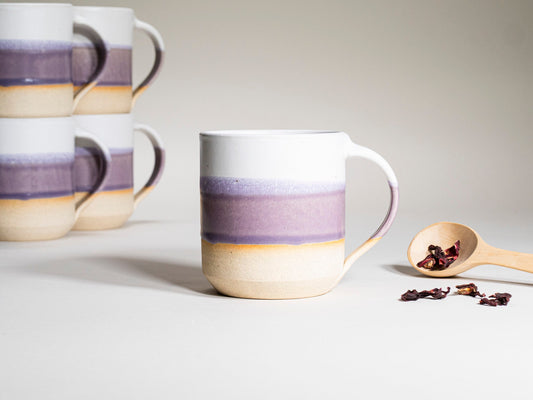 Purple and white ceramic coffee mug with handle, 14 oz stoneware style bands.
