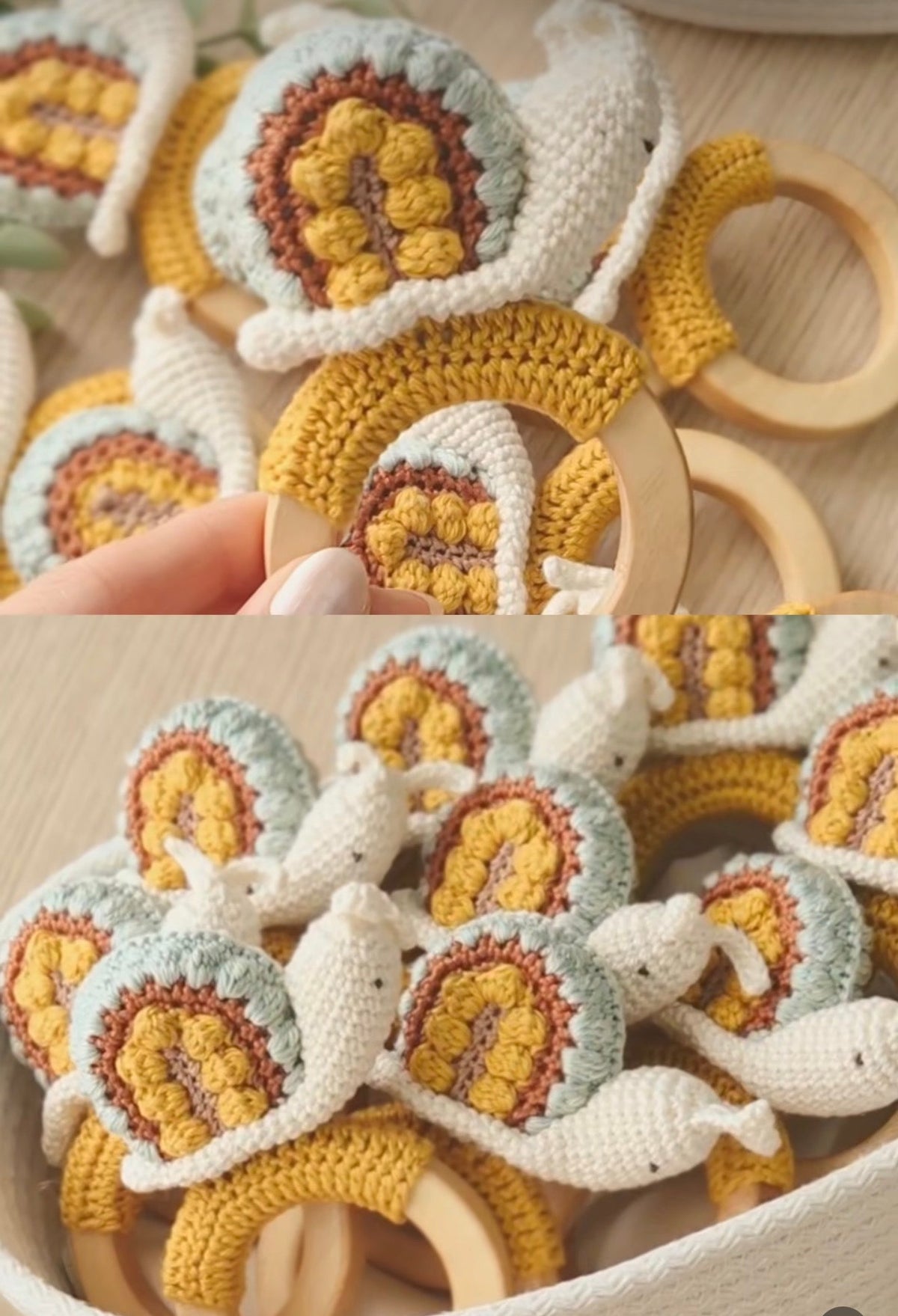 Handheld crocheted snail rattle with wooden ring grip and yellow, brown, and white stitch detail