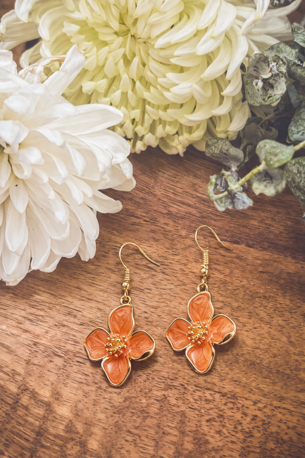 Orange flower drop earrings with gold-tone hooks, dangle floral charm