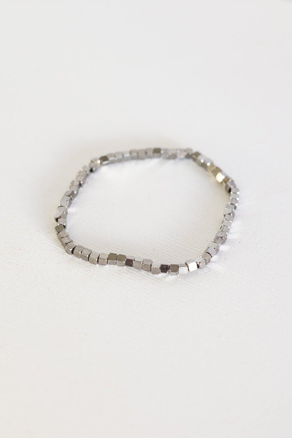 Single silver-tone Ember bracelet with small square beads