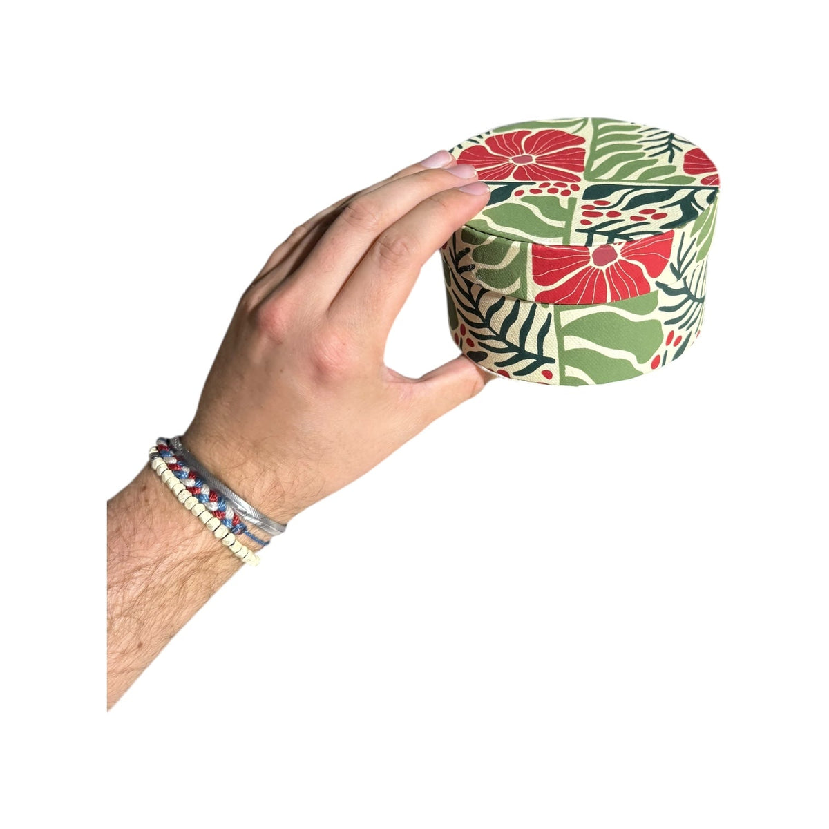 Round light-green botanical nesting gift box with large red blossoms, handmade recycled paper