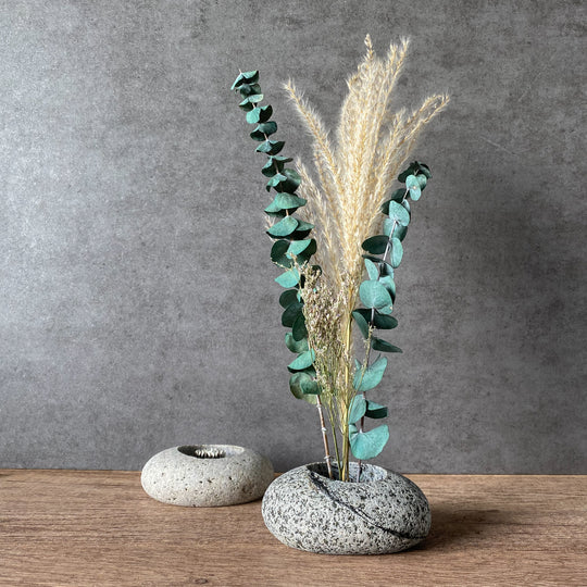 Speckled stone ikebana vase with wide round opening for tall stem arrangement